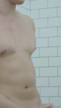 Muscle boy jerking out a much-needed load in the bathroom