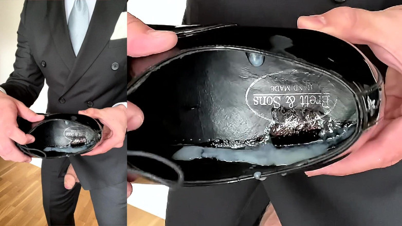 Master Shiny Shoes: Muž v obleku si honí lakované boty