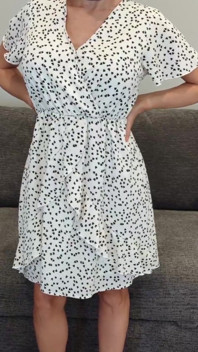 Sadie in a White Dress with Hearts and Red Heels