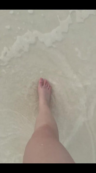 Running my bare feet on the white beach sand by the ocean.