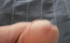 I lay and caress my cock and jerk off it longs