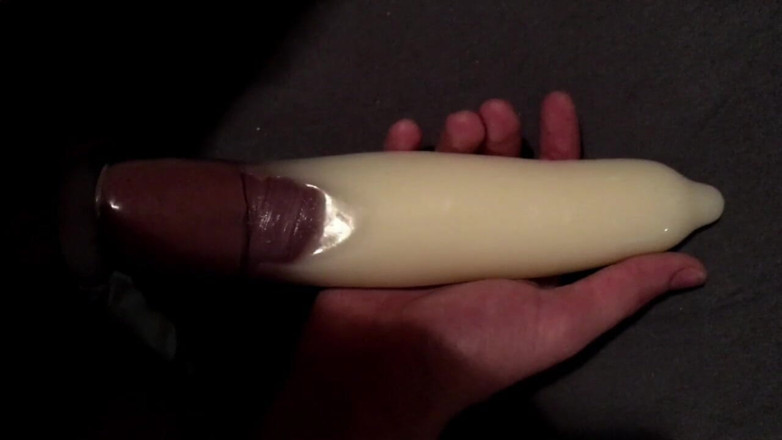 Lawrence: Filling up a condom...! Completely