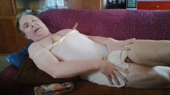 Andi Geil: Jerking off with clips under Ilse's petticoat