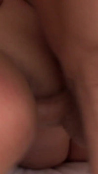 Sexy and willing brunette masturbates before being fucked by two big and willing dicks