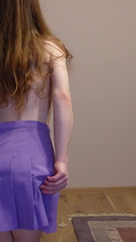 Petite Redhead in Cute Miniskirt Striptease