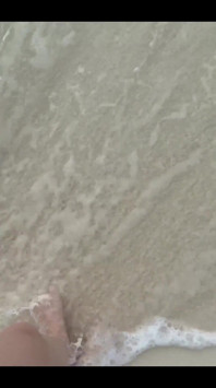 Running my bare feet on the white beach sand by the ocean.
