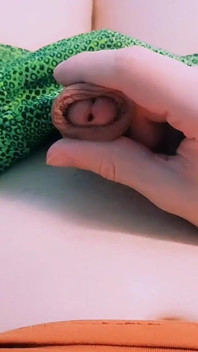 Guy in Beautiful Green Swimming Trunks Erotically Massages His