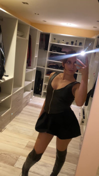 Latex Whore Shows You Her Tits