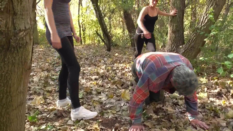 Femdom Austria: Kicking the old slave in the forest