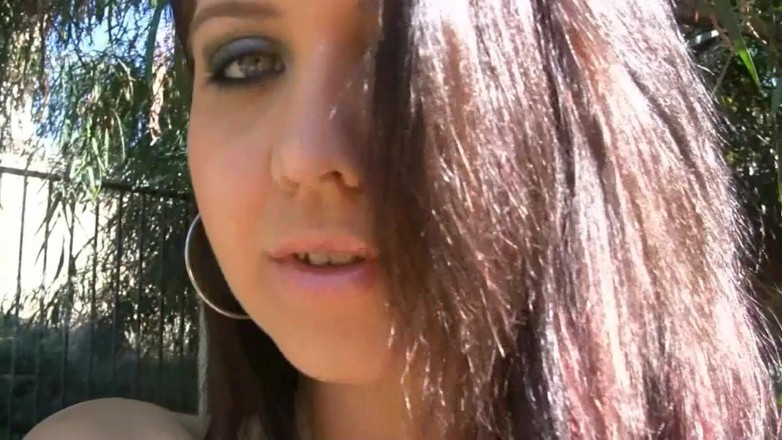Injoy X: Young busty Arab shows off her tits outside their house