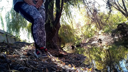 Elena: BBW in leggings pissing by the lake in a park