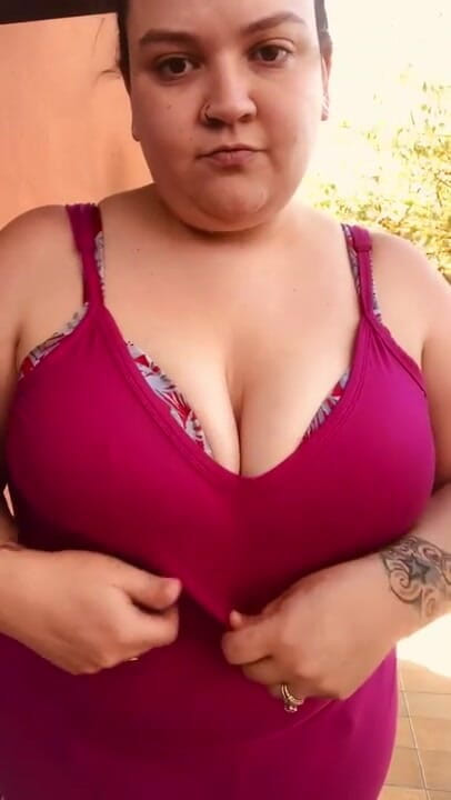 Big titty brunette: Big titty strip tease