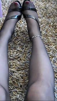 Dani Leg in Black Pantyhose and Pretty Dress and Hills with Polished Nails