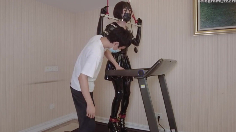 Aisan girl bondage: Mz24 - a Girl Bound to a Treadmill with Metal Restraints...