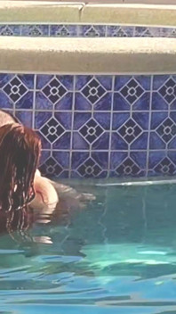 Hot Long Haired Ginger MILF Taking a Dip and Fucking in Outdoor Pool