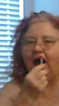 Mature BBW Redhead Nurse Vicki Talks to You as She Makes a Lipstick Applying Video for You!