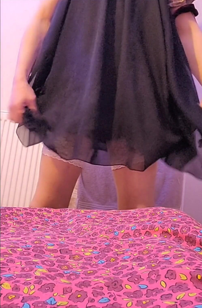 Girlie Simone: ladyboy in black dress and white lingerie