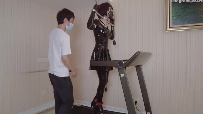 Aisan girl bondage: Mz24 - a Girl Bound to a Treadmill with Metal Restraints...