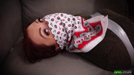 Gag Attack: Mila in tape bondage