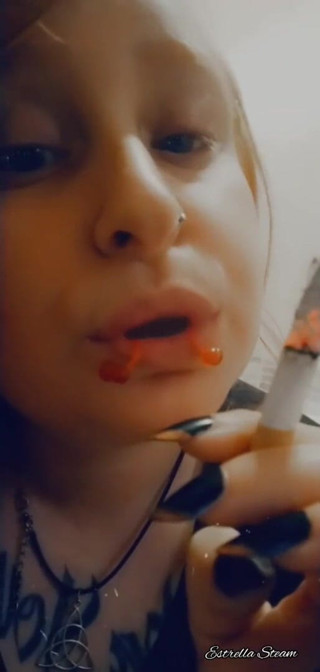 Estrella Steam: Smoking girl close up