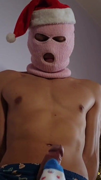 Footjob, l’énorme bite du père Noël en pyjama de Noël