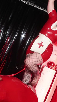 Rubber Nurse Facesitting Bound Patient