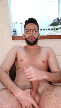 Jerking my big uncut cock with lube until I cum