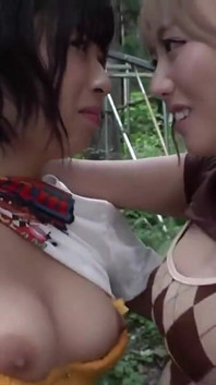 A Blonde and a Dark-haired Beauty Share Wild Passion Beneath the Open Sky -b