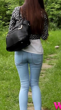 Diana Tries to Hold Her Pee Grabbing Her Crotch While She Is on a Walk Trough a Forest