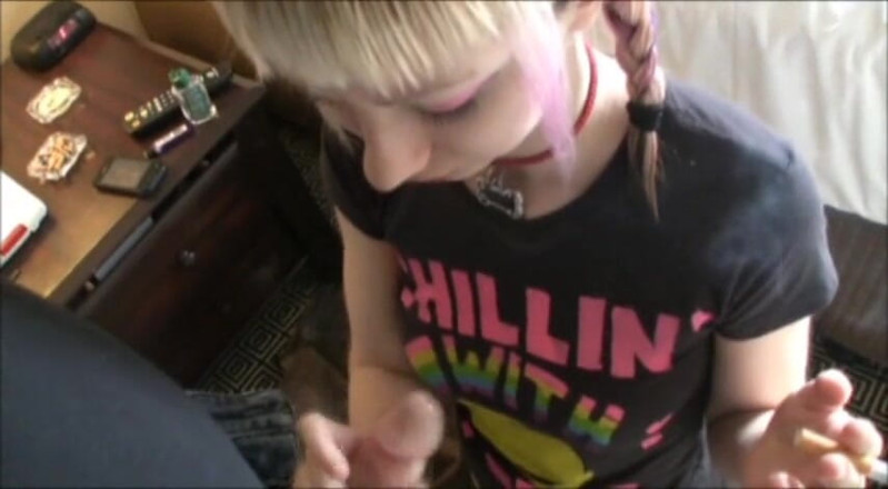 Femdom Austria: Ponytailed blonde teen jerking dick while smoking a cigarette