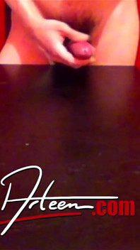 Standing Slim Twink Jon Arteen Wanks His Cock with Oil and Squirts a Lot of Cum Away on the Table Moaning, Front View
