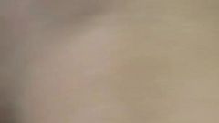 This horny brunette with natural tits enjoys playing with hard cocks by sucking and licking them sensually