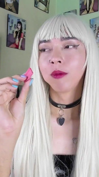 Cute teenager playing with bubble gum bombs