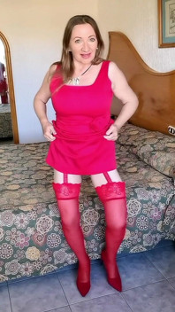 Hot MILF Teasing in Red Stockings and High Heels Shoes