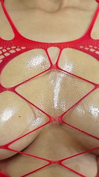 Nippelspiel in Rotem Bodystocking