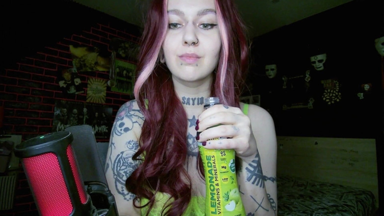 Horror circus: Sexy Alternative Redhead Drinking Soda and Burping