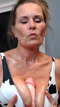 A lot of titties with a little oil, with a little dildo action.