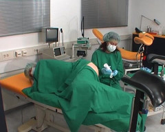 Rubber & Clinic Studio - 1ATOYS: Nurse in green surgery outfit