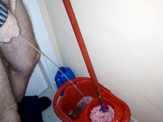 Sex hub male: John is taking a piss into the cleaning bucket