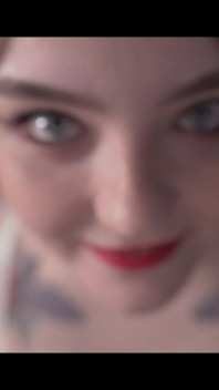 A Girl Is Messing with a Macro Camera