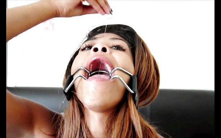 Naughty Brown Barbie: Sloppy deepthroat in open mouth gag