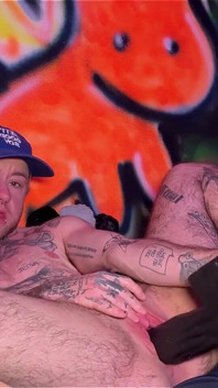 Tattooed Tboy XXX Skips Stretches His Pink Boy Pussy with an Xl Cross Dildo