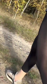 Walking around in see-through leggings in a park. Flash nudity