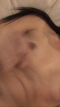A beautiful Asian woman comes back from a walk and relaxes by stroking his cock