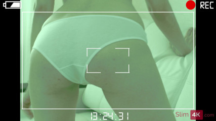 Slim4K: Short-haired redhead in sexy legwarmers enjoying standing sex with a...