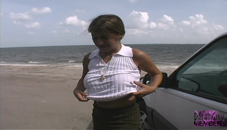 Dream Girls: Big tit Dominique flashes on a beach