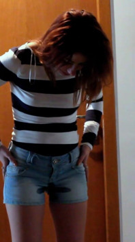 Skinny Redhead Pee in Her Short Jeans