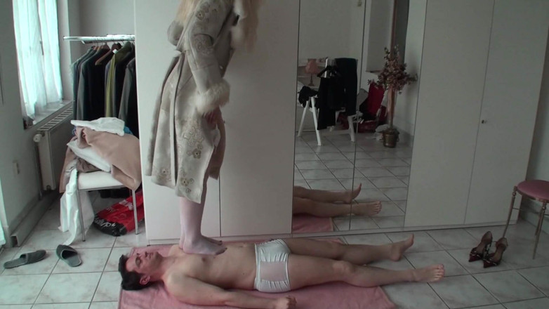 Femdom Austria: Stomping him in lingerie and leather fur-coat