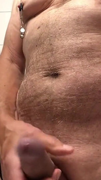 Showing Hard Nipples off While Pissing