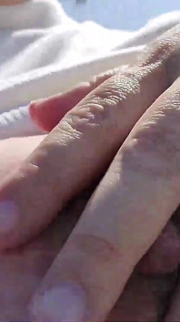 A Frustrated Married Woman Masturbates with Her Legs Open and Her Breasts Exposed in an Outdoor Parking Lot